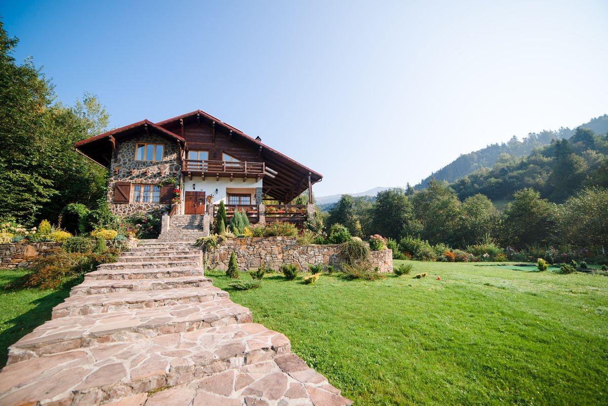 Beautiful house in high mountains during the summer.