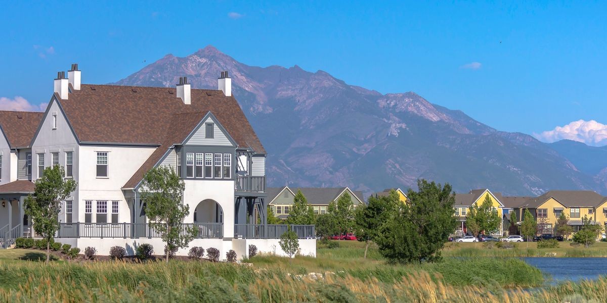 House beside a lake with view of the mountain